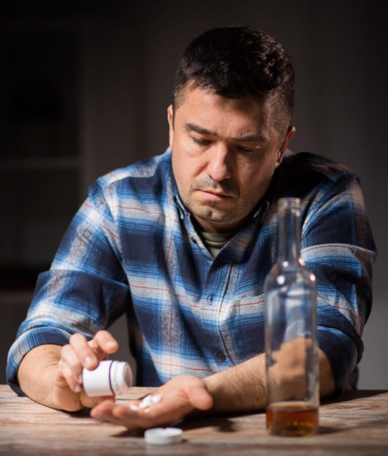 man taking a medicine